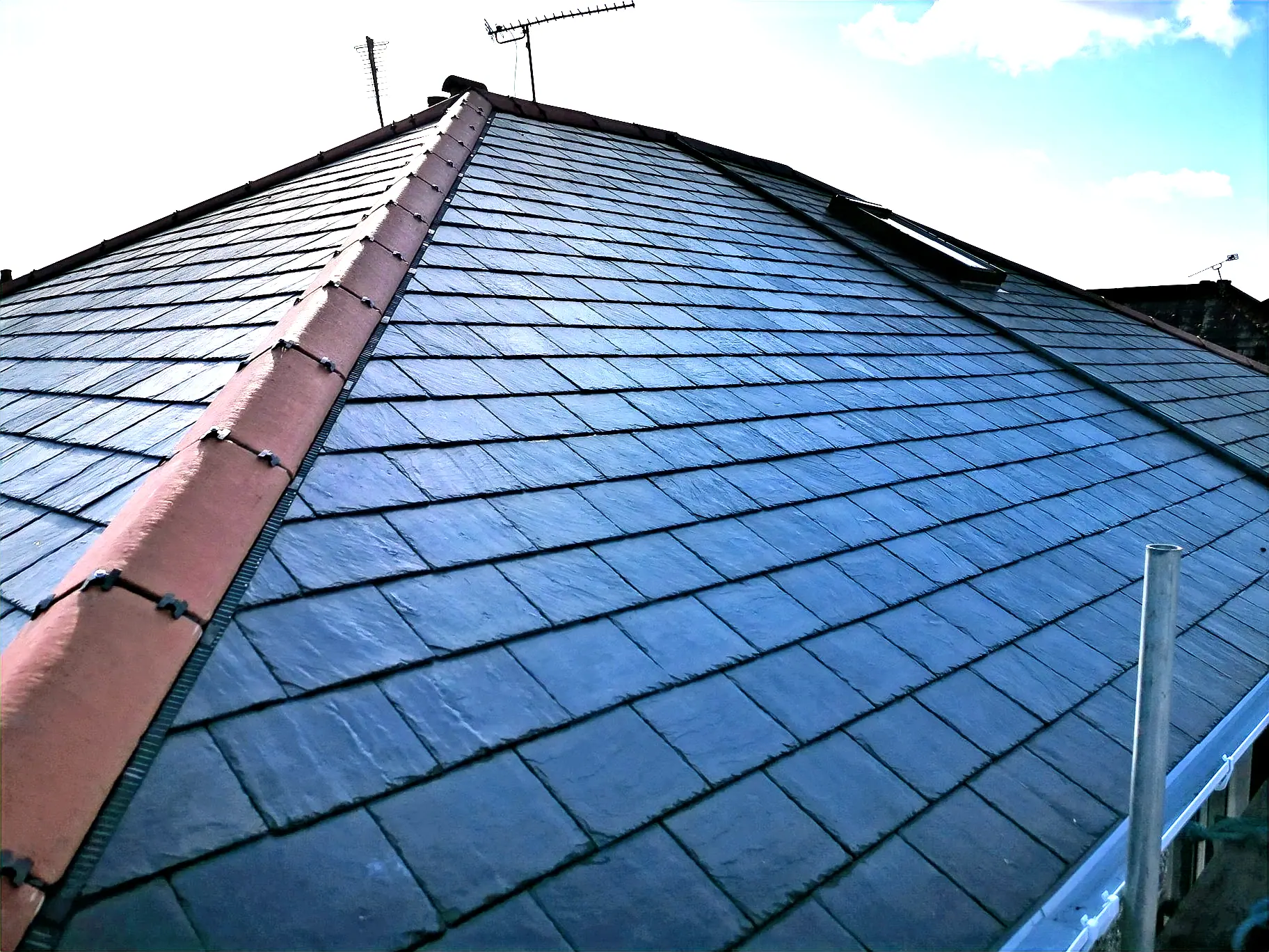 Slate tiled roof replacement in progress in Bournemouth by Apex Roofing Services