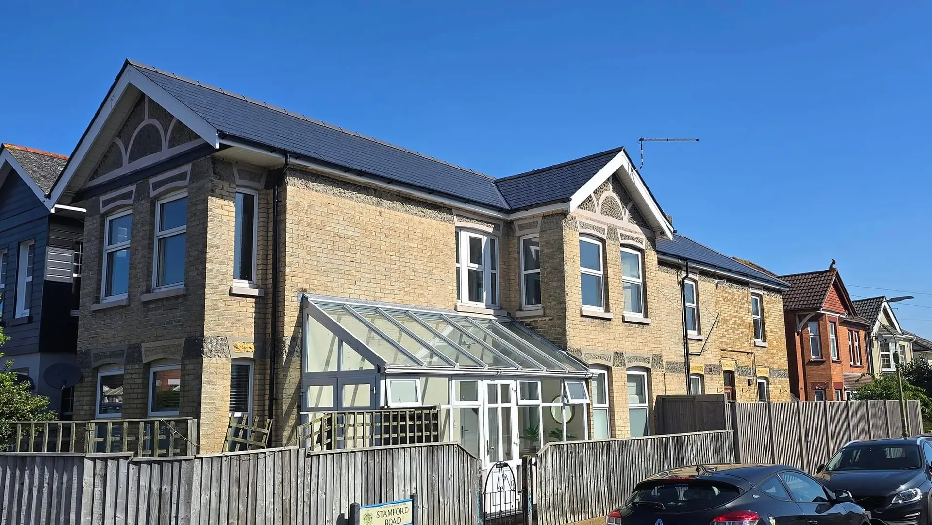 Dorset house with new roof tiles fitted by Apex Roofing Services Ltd