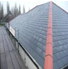 Slate tile roof being re-roofed with red ridge tiles, Apex Roofing Services Bournemouth