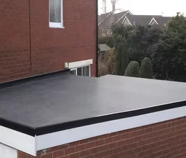 Black EPDM flat roofing installed on a house extension, Apex Roofing Services Bournemouth