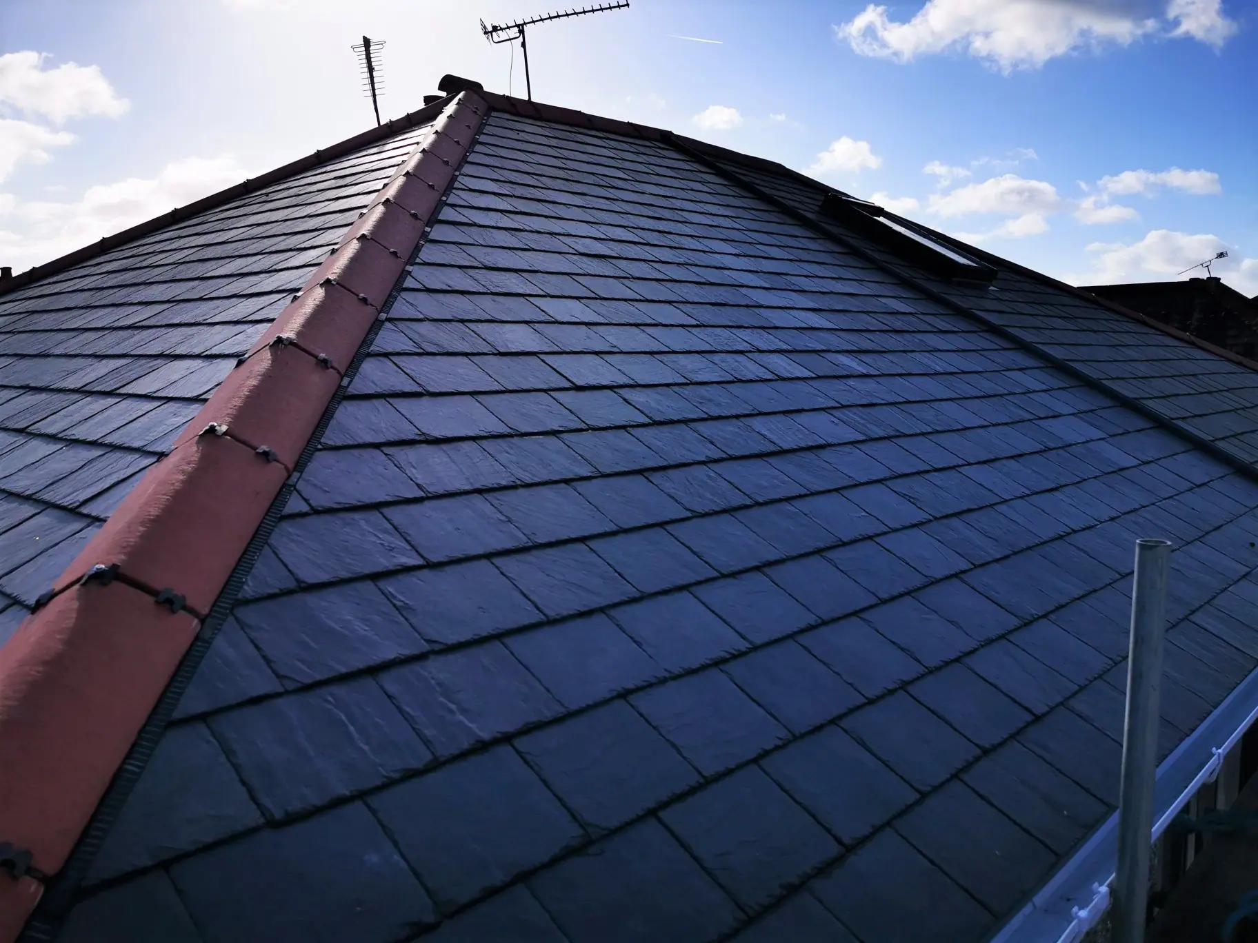 Slate tiled re-roof completed by Apex Roofing Services Ltd in Bournemouth