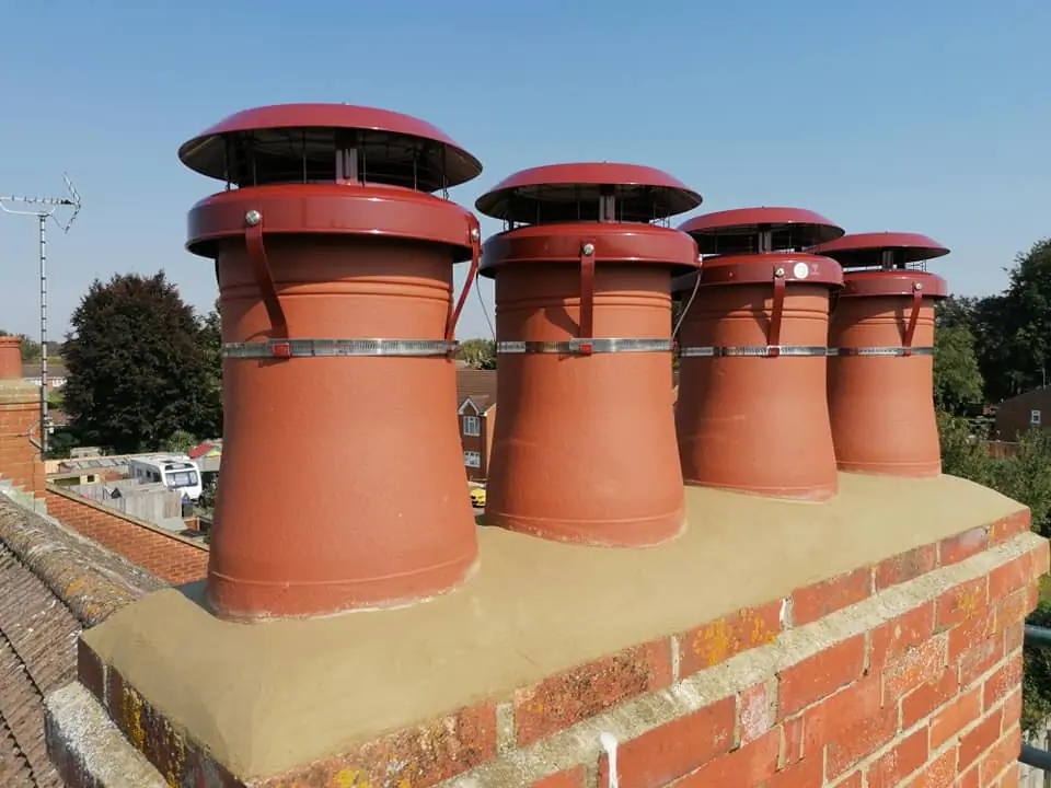 Chimney cowls fitted on a roof in Bournemouth by Apex Roofing Services
